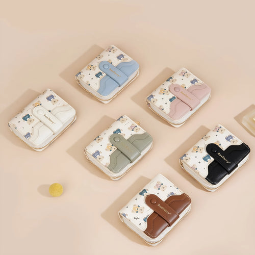 Cartoon printed women's wallet in beige with visible sewing thread details and short horizontal shape