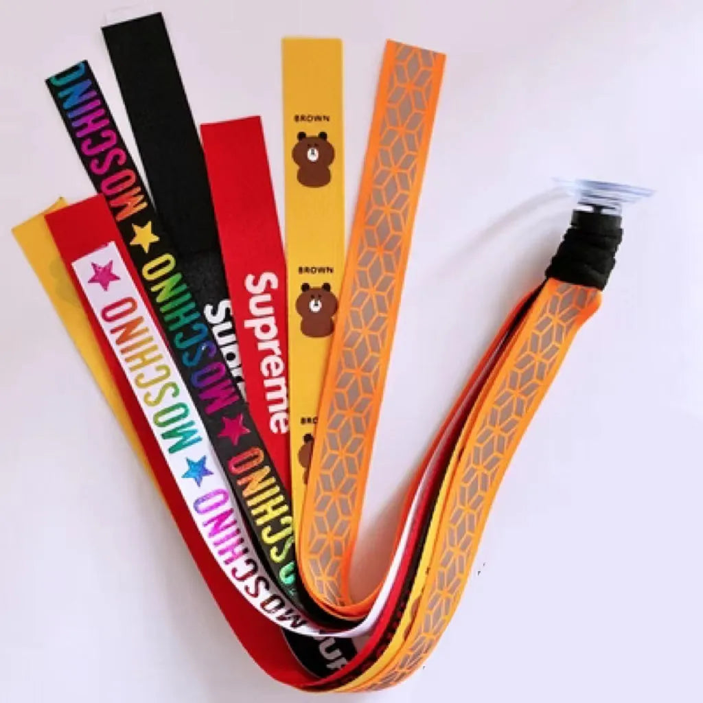 Close-up of a colourful decorative ribbon streamer attached to a child's helmet for roller skating or skiing.