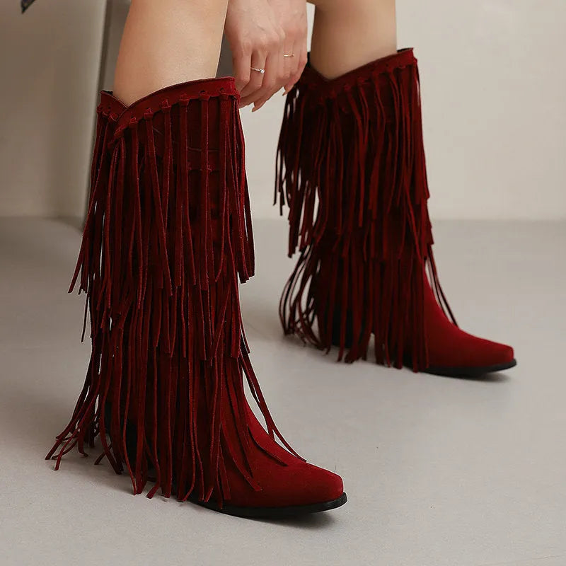 Women's suede knee-high boots with tassel, square toe, chunky heel and platform sole in beige.