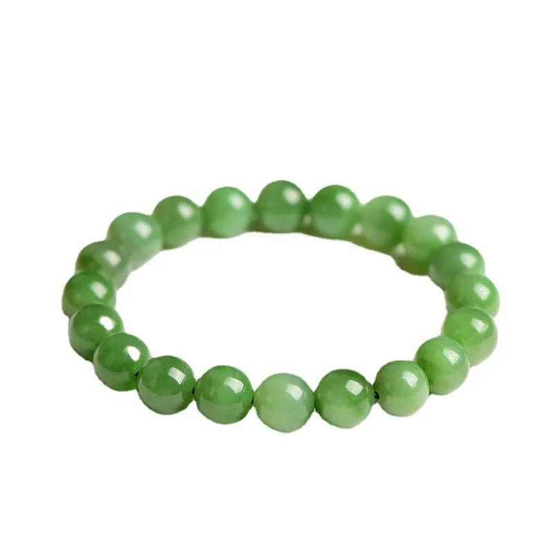 Natural Hetian jade bead bracelet in jasper colours, showing polished beads on a wrist.
