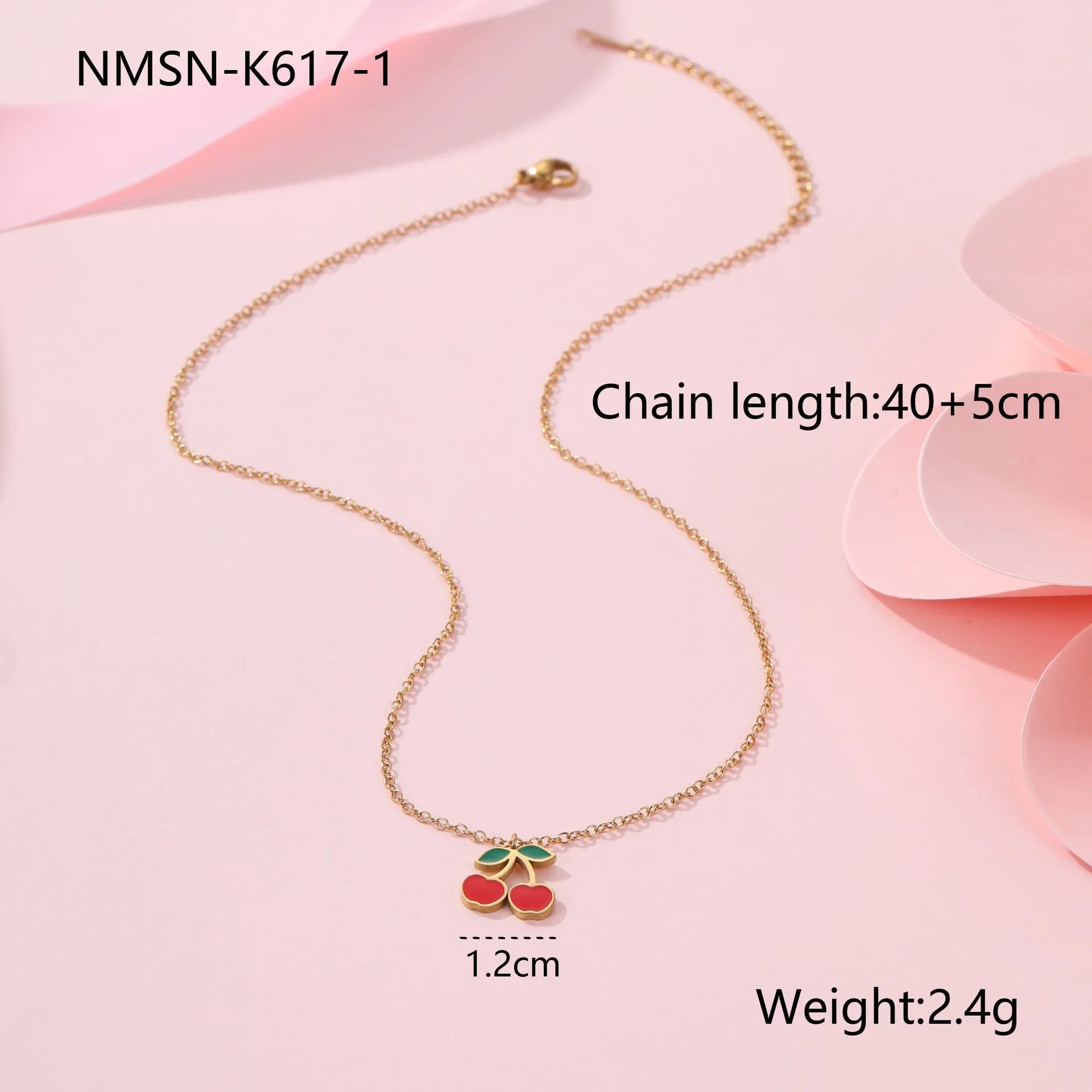 Cherry shaped jewellery set with necklace, bracelet, earrings, and ring in gold-plated stainless steel
