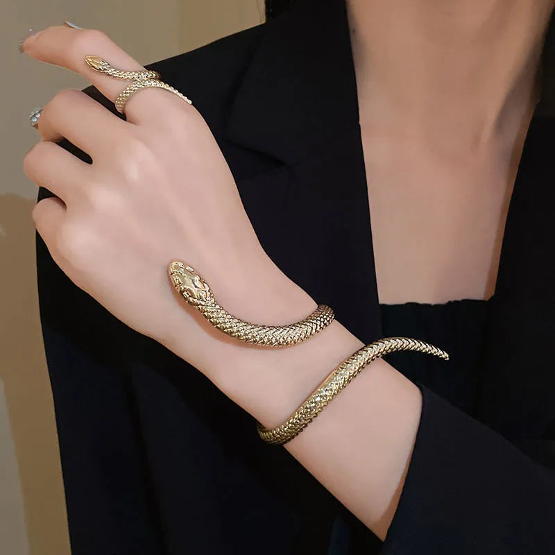 Gold and silver exaggerated twisted snake design ring and bracelet jewellery set
