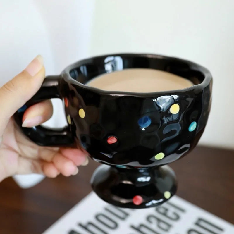 Hand-pinched irregular ceramic mug with solid colour design, approximately 14.5cm tall