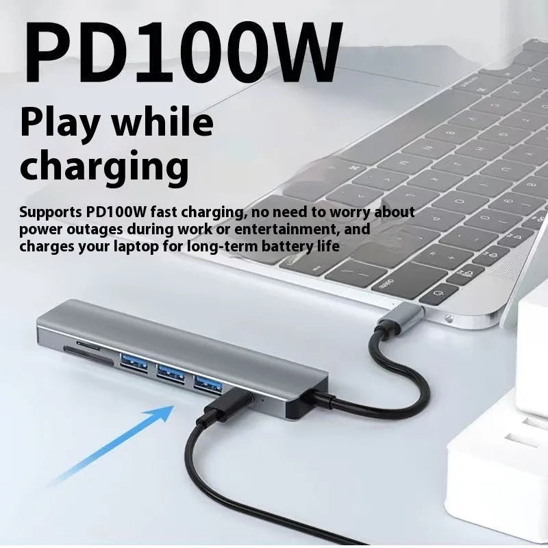 USB-C 7-in-1 expansion dock with HDMI port and USB 3.0 hub on a 15cm cable.
