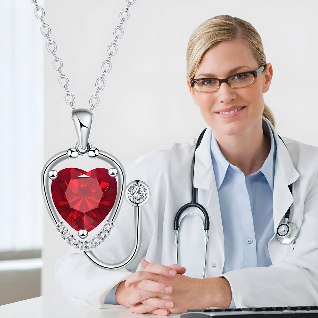 Women's fashion necklace with wings cross stethoscope pendant in red diamond colour