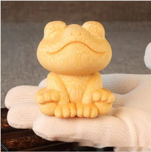 Smiling frog bamboo carving ornament measuring 5cm height with cartoon cute style decorative design