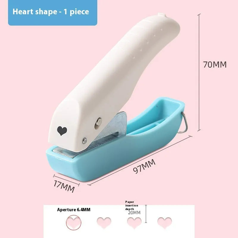 Manual craft punching machine with love heart, star, and round pattern heads for embossing.