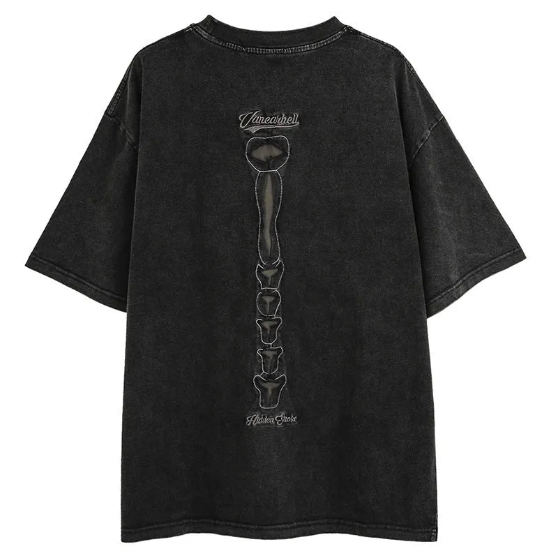 Black loose fit t-shirt with skull and letter print featuring drop-shoulder sleeves.