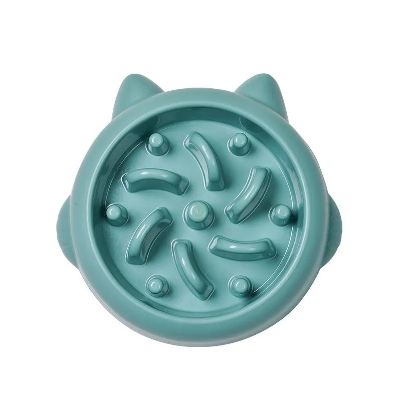 Green pet slow feeder bowl with bone-shaped raised ridges