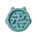 Green pet slow feeder bowl with bone-shaped raised ridges