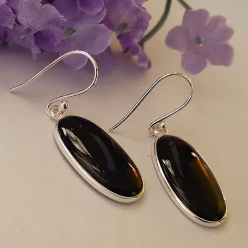 Chinese style women's earrings with oval black agate pendant and 925 silver electroplated alloy construction