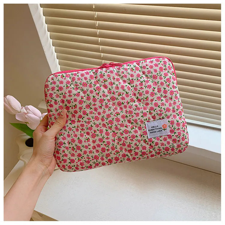 Floral print laptop bag for women in green flower pattern showing storage compartments and slim profile