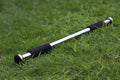 Adjustable steel pull-up bar extended for doorway installation with length markings showing 62cm to 100cm range