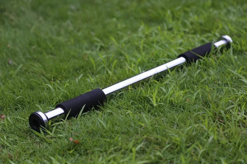 Adjustable steel pull-up bar extended for doorway installation with length markings showing 62cm to 100cm range