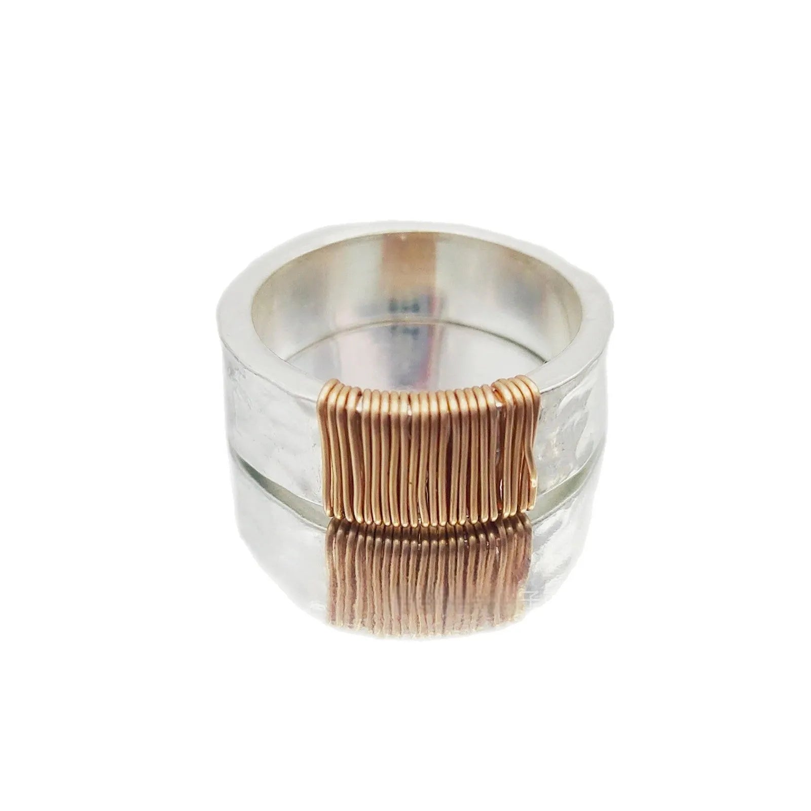 Copper bracelet with vintage ring design featuring irregular coil pattern in silver golden colour