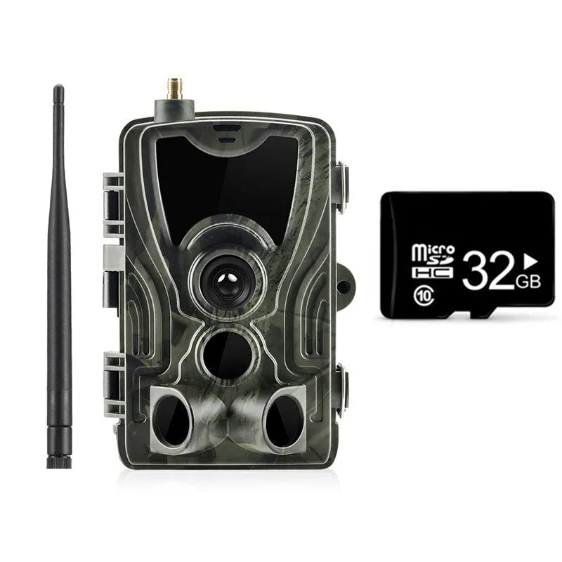 Outdoor camouflage surveillance camera with wide-angle lens on a green background.