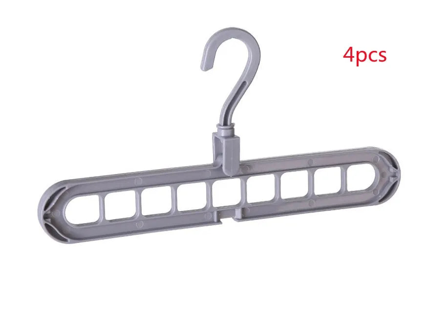 Plastic clothes hanger with rotating hook in assorted colours on white background