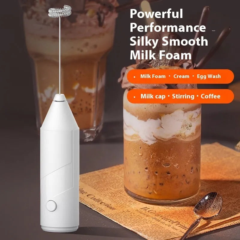 Mini handheld electric milk frother in black, white or khaki colours with USB charging port and stainless steel frothing wand