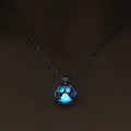 Hollow dog paw luminous alloy necklace with bamboo link chain and pendant, blue green colour option on white background