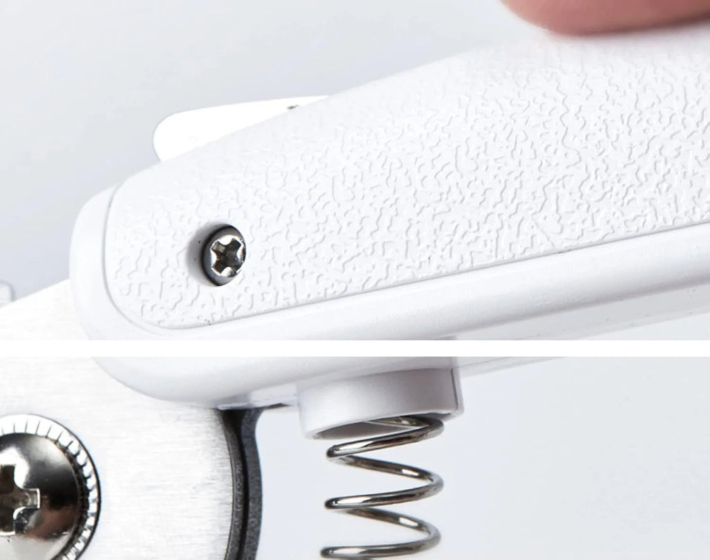White pet nail clippers with LED light, transparent anti-splash baffle, and a nail file.