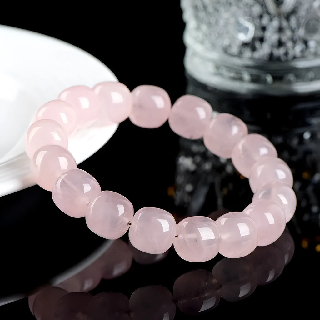 Pink bracelet with geometric barrel beads made from natural bamboo crystal measuring 11 * 12mm