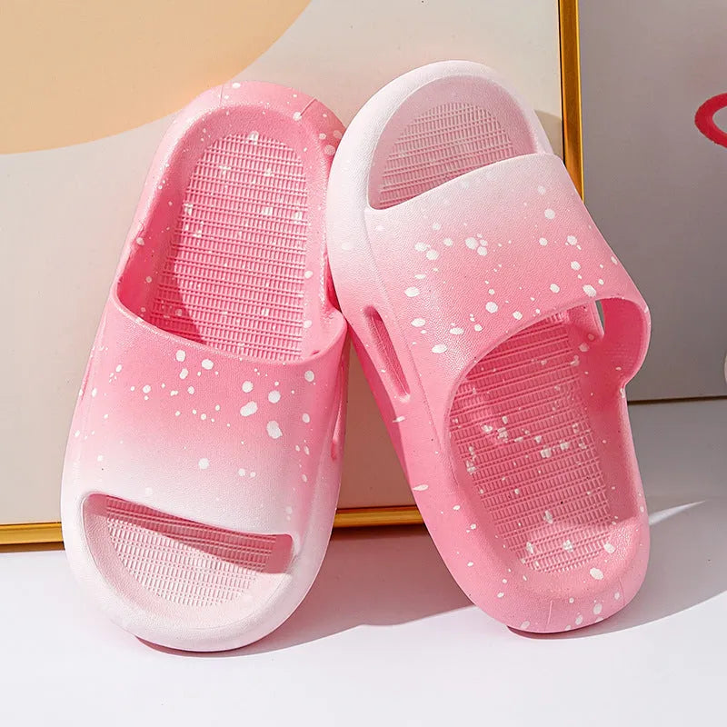 Gradient coloured PVC summer slippers for children on a non-slip sole.