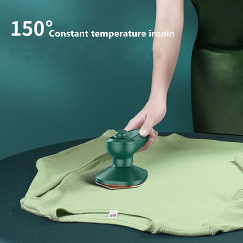 Dark green portable hanging ironing machine with ceramic panel and sharp corner design for travel use
