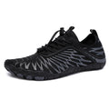 Men's white lace-up casual trainers with rubber soles showing gauze lining and non-slip outsole