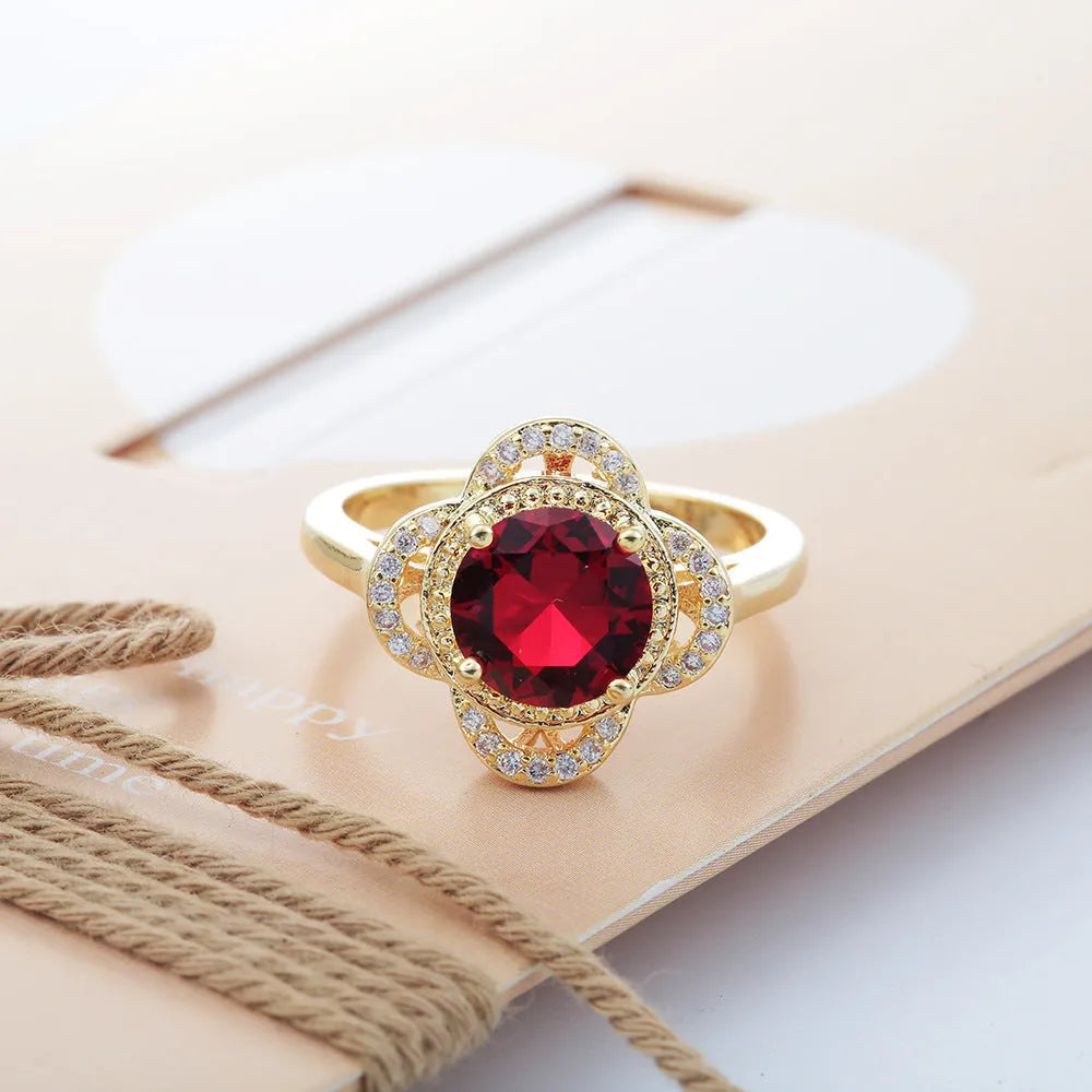 Copper ring with a fruit-shaped zircon stone inlaid, shown in colour 10-6-1395.