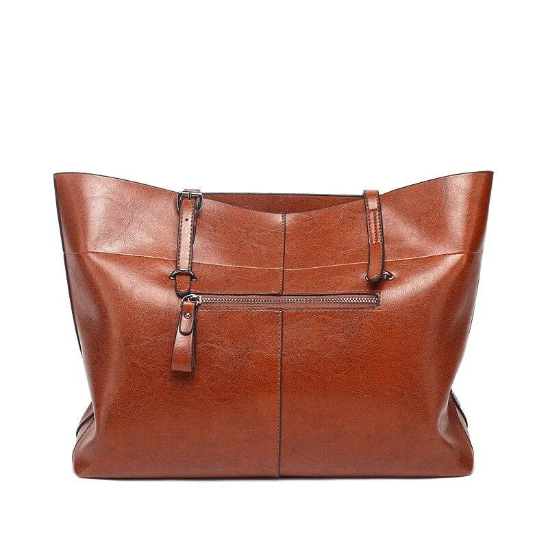 Women's wax cowhide leather handbag with horizontal silhouette and cross-body strap