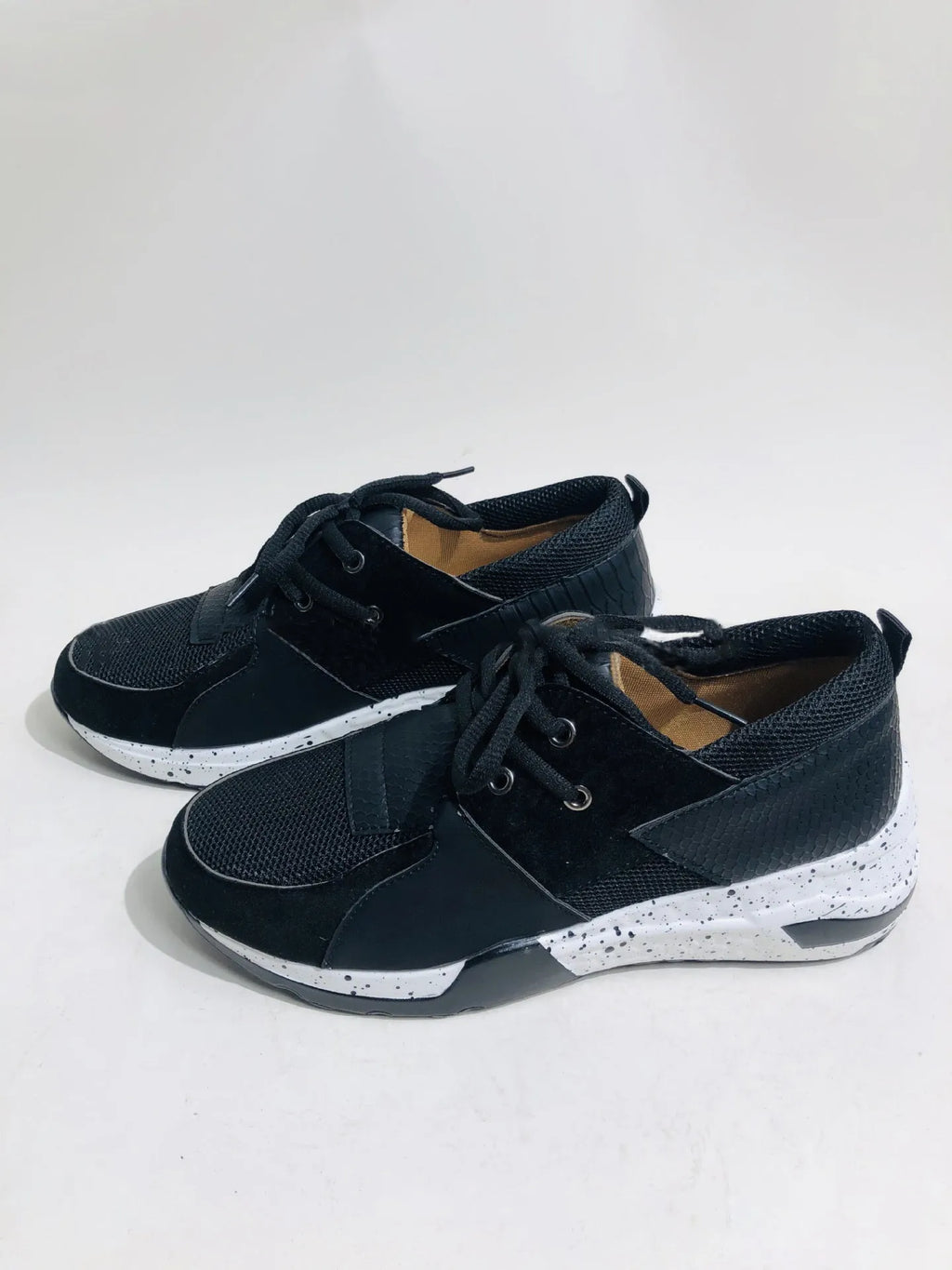Women's casual suede sneakers with wedge heel in black, leopard, panther, pink, and snake pattern colours