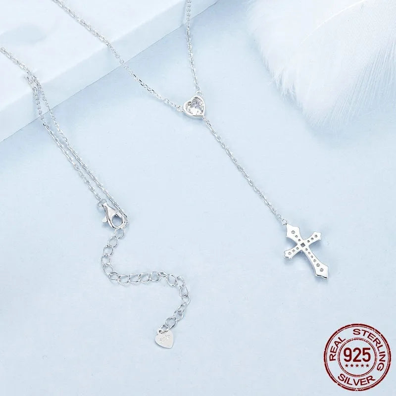 Sterling silver V-neck love cross pendant necklace on an O-ring chain in colour BSN384.