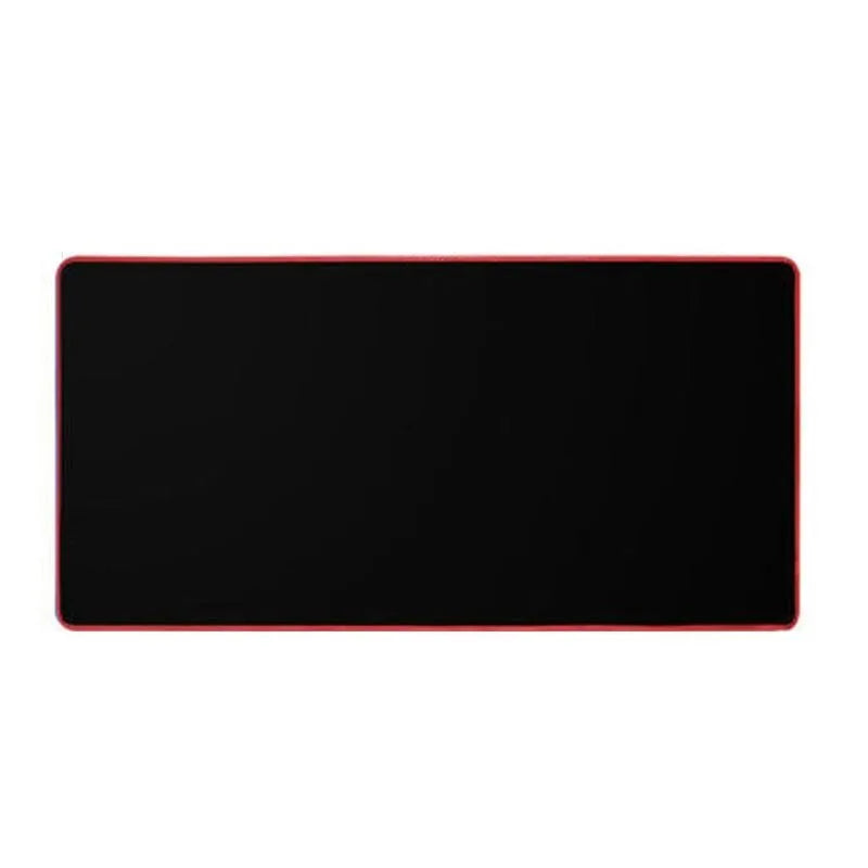 Oversized rubber mouse pad 30x60cm with stitched edges, black colour, on a desk with keyboard and mouse