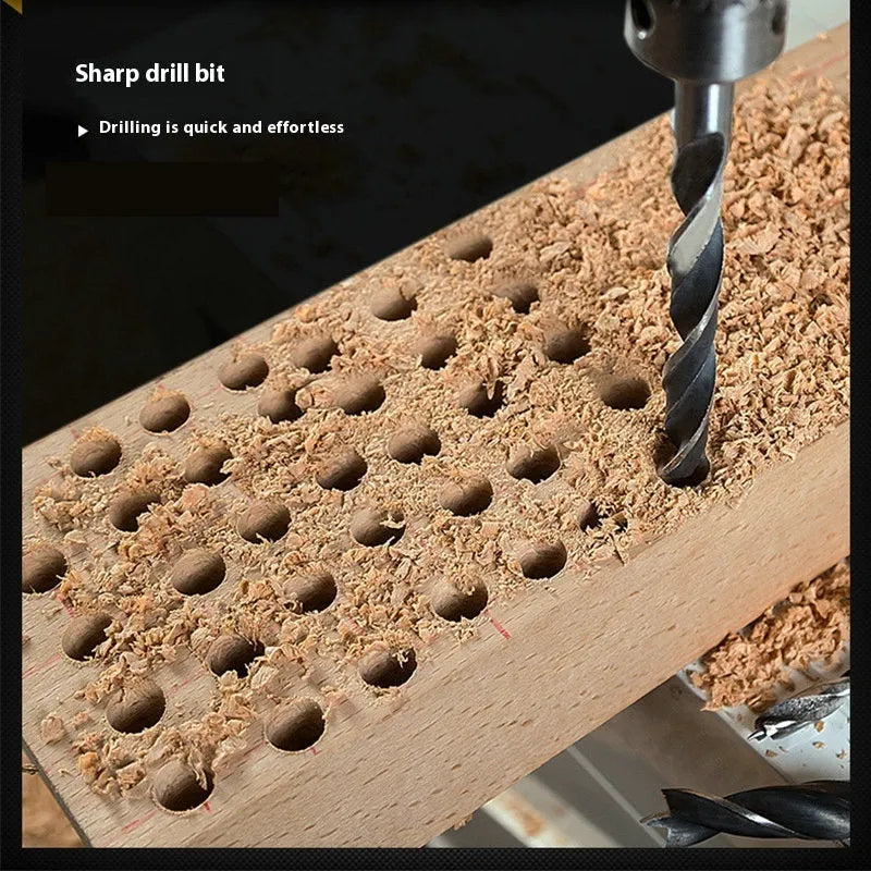 Set of five steel woodworking twist drill bits with hexagonal handles placed on a surface