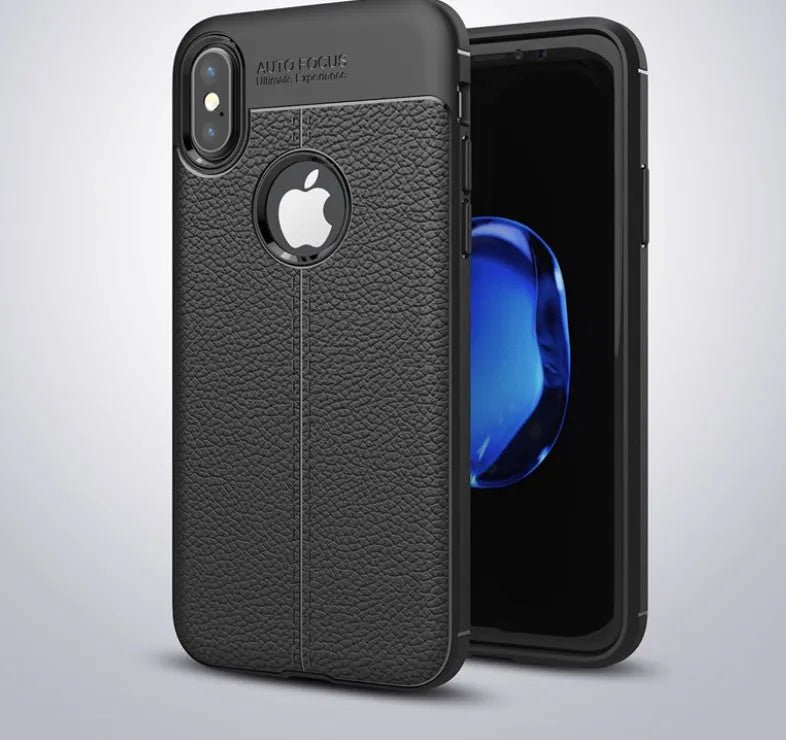 WeFor black PU leather texture slim silicone case for OnePlus 6 mobile phone on a table