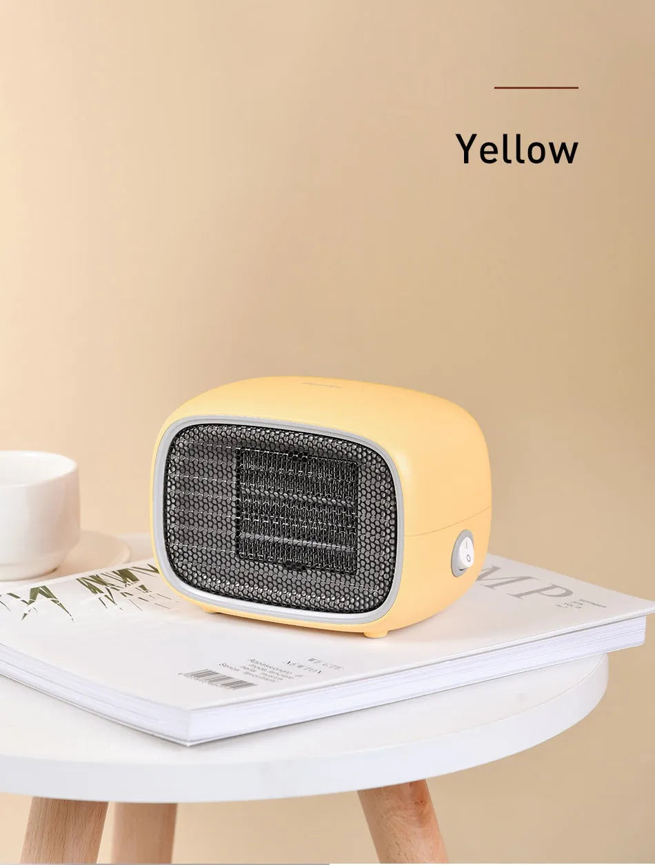Green mini ceramic heater with compact design showing dimensions and ventilation grille
