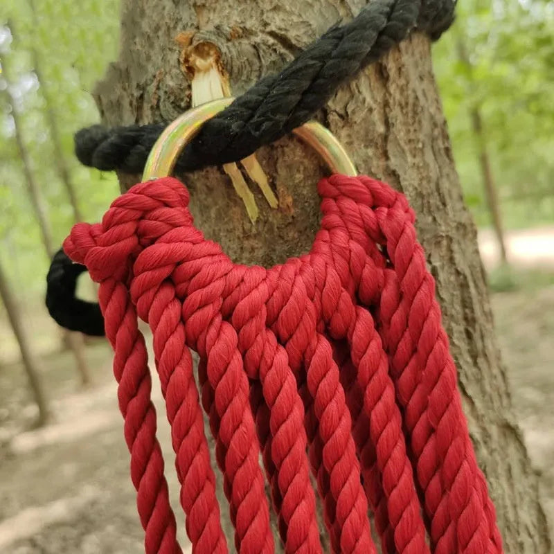 Nylon rope mesh hammock hung between trees showing 1.1m width