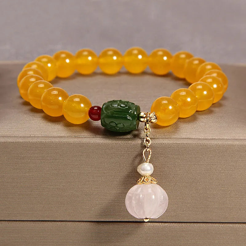 Women's yellow agate and crystal bracelet on gold silk thread in khaki colour