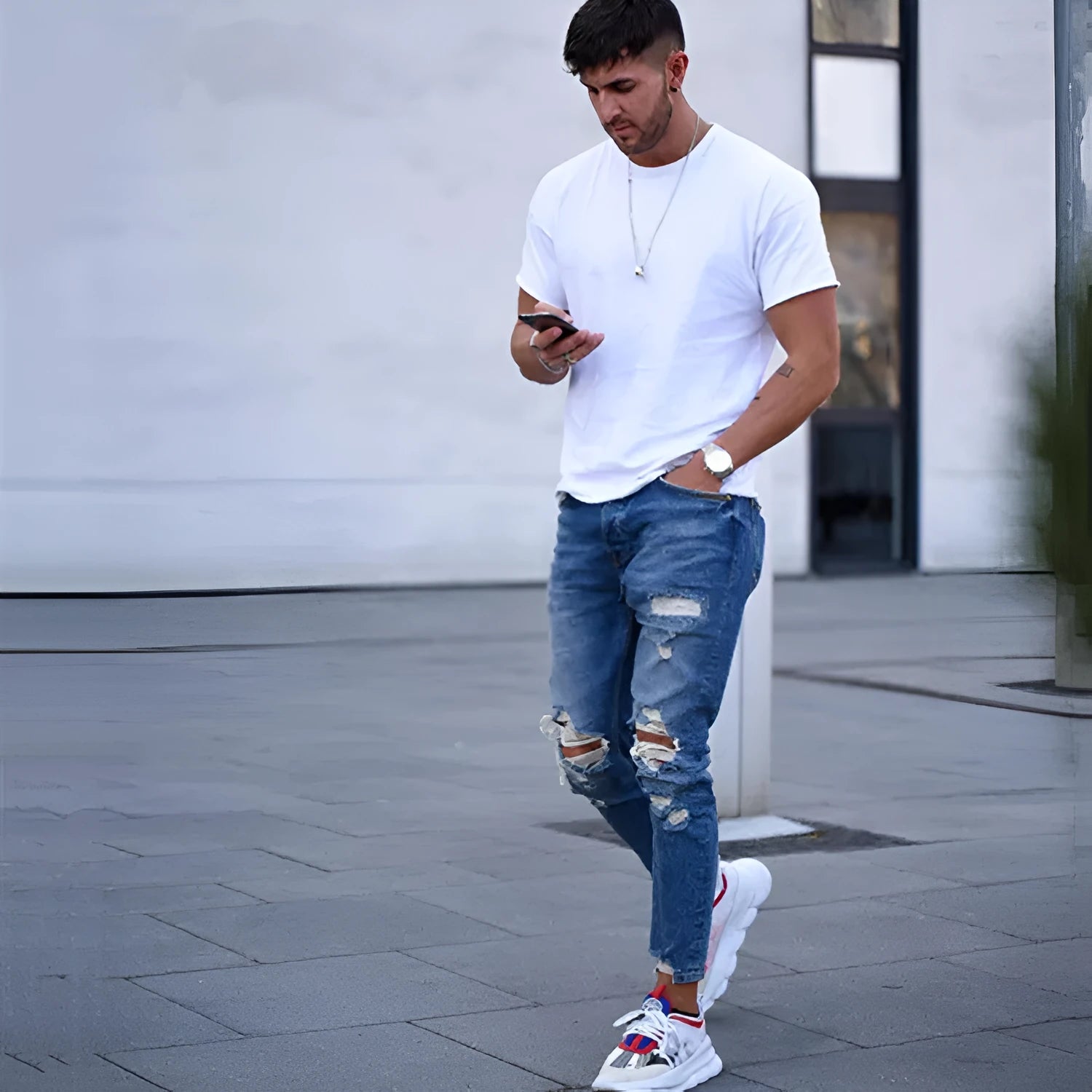 Deep blue cotton men's jeans laid flat, available in sizes S to 3XL.