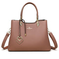 Women's black PU leather shoulder messenger bag with multi-layer compartments and visible stitching details