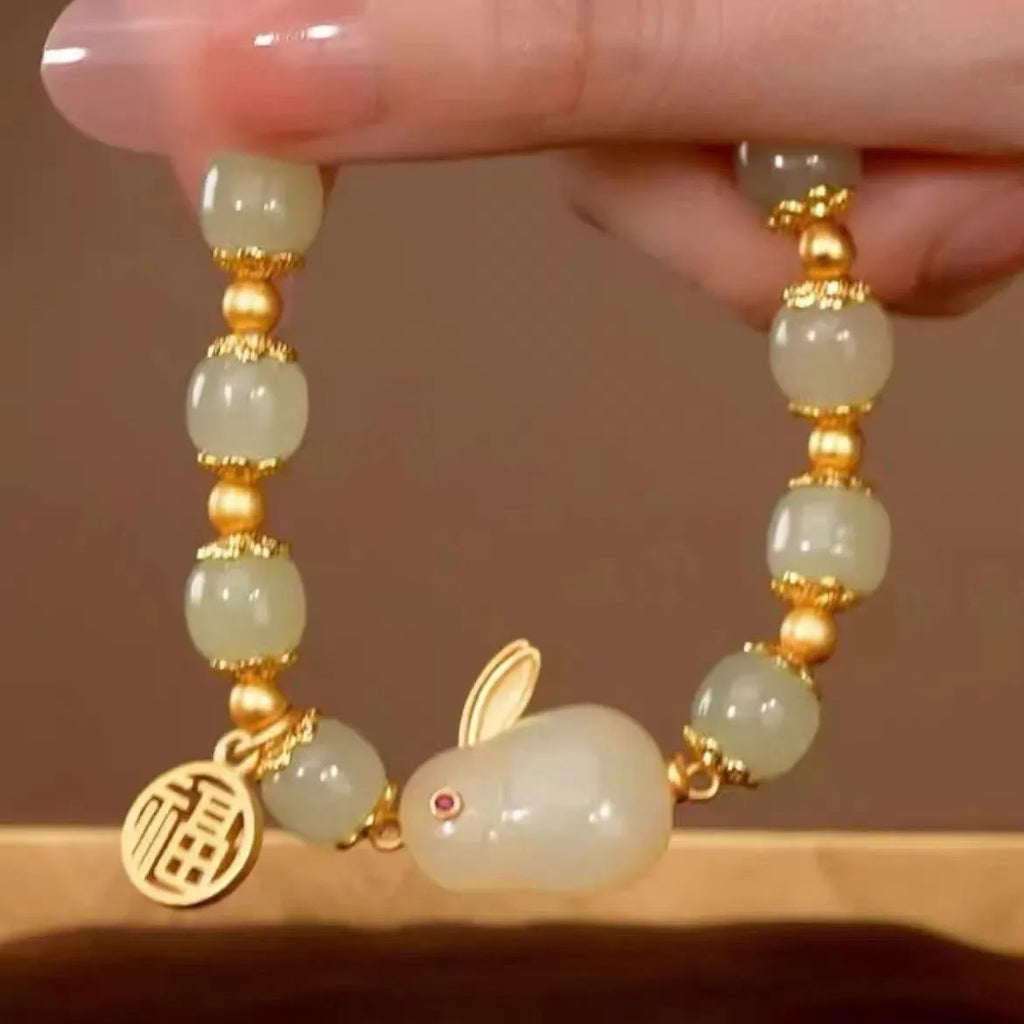 Green fu hare jade pendant on black elastic women's bracelet