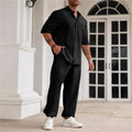 Men's casual apricot coloured cotton linen short sleeve shirt and trousers set laid flat.