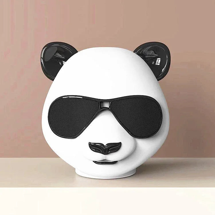 Portable mini Bluetooth speaker with classic style design showing USB charging port