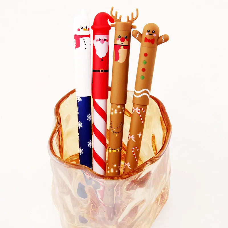 Four erasable gel pens in red, black, green, and blue with Christmas themes on a white background