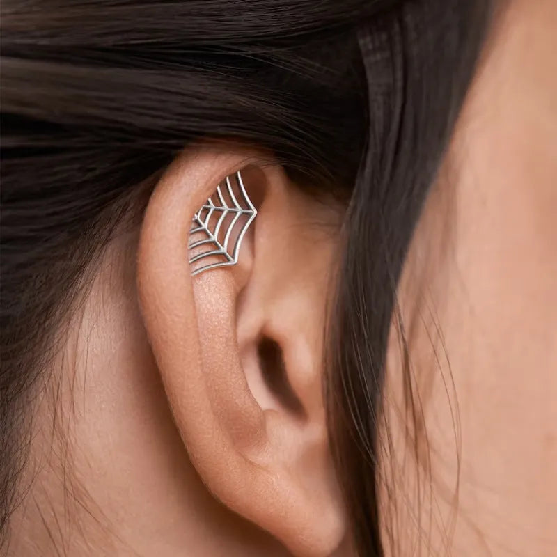 Spider web stud earrings with geometric mesh pattern in gold and silver electroplated colours