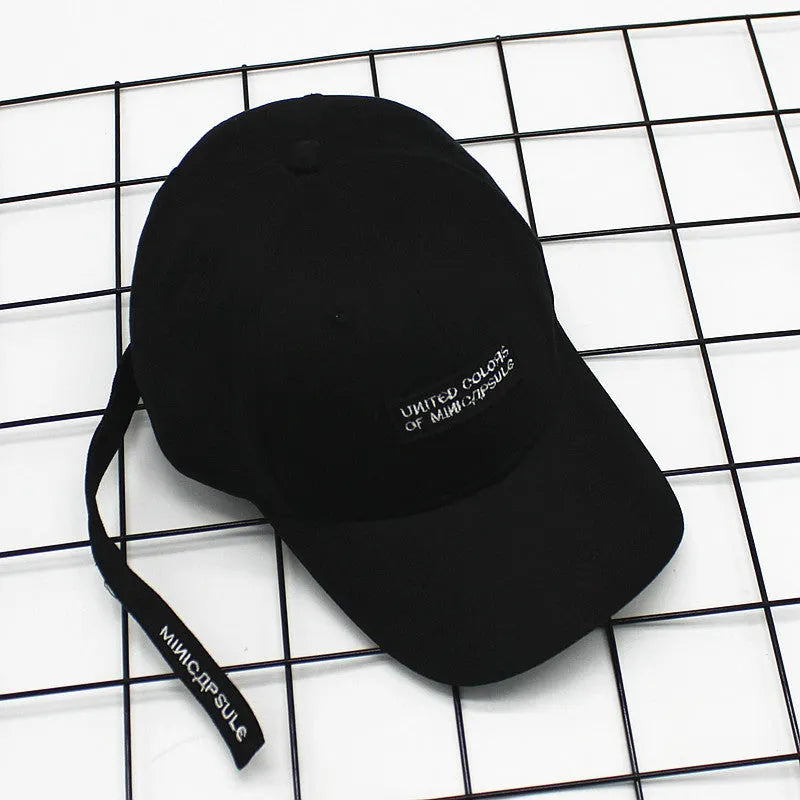 Cotton baseball cap with curved brim and embroidered MINI lettering in black colour