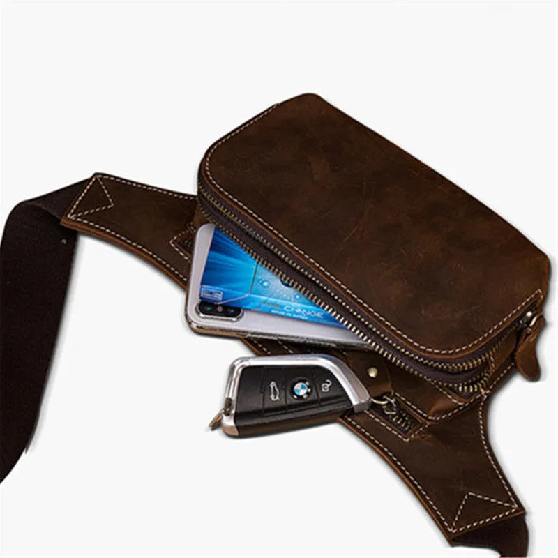 Brown cow leather sports waist bag with pull closure showing internal mobile phone pocket