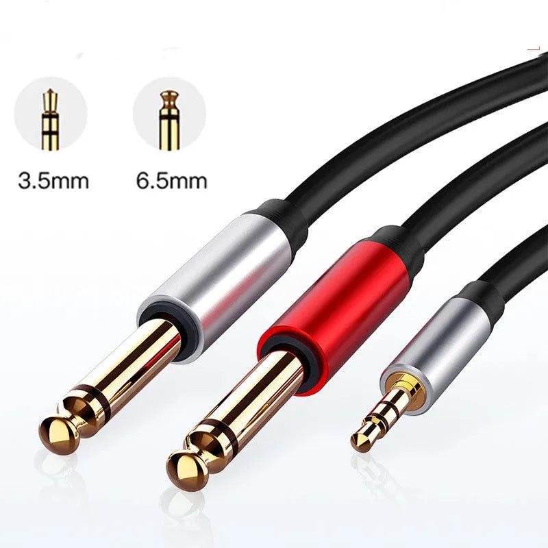 3.5mm to 6.35mm male-to-male audio cable with gold-plated connectors on a black coiled cable.