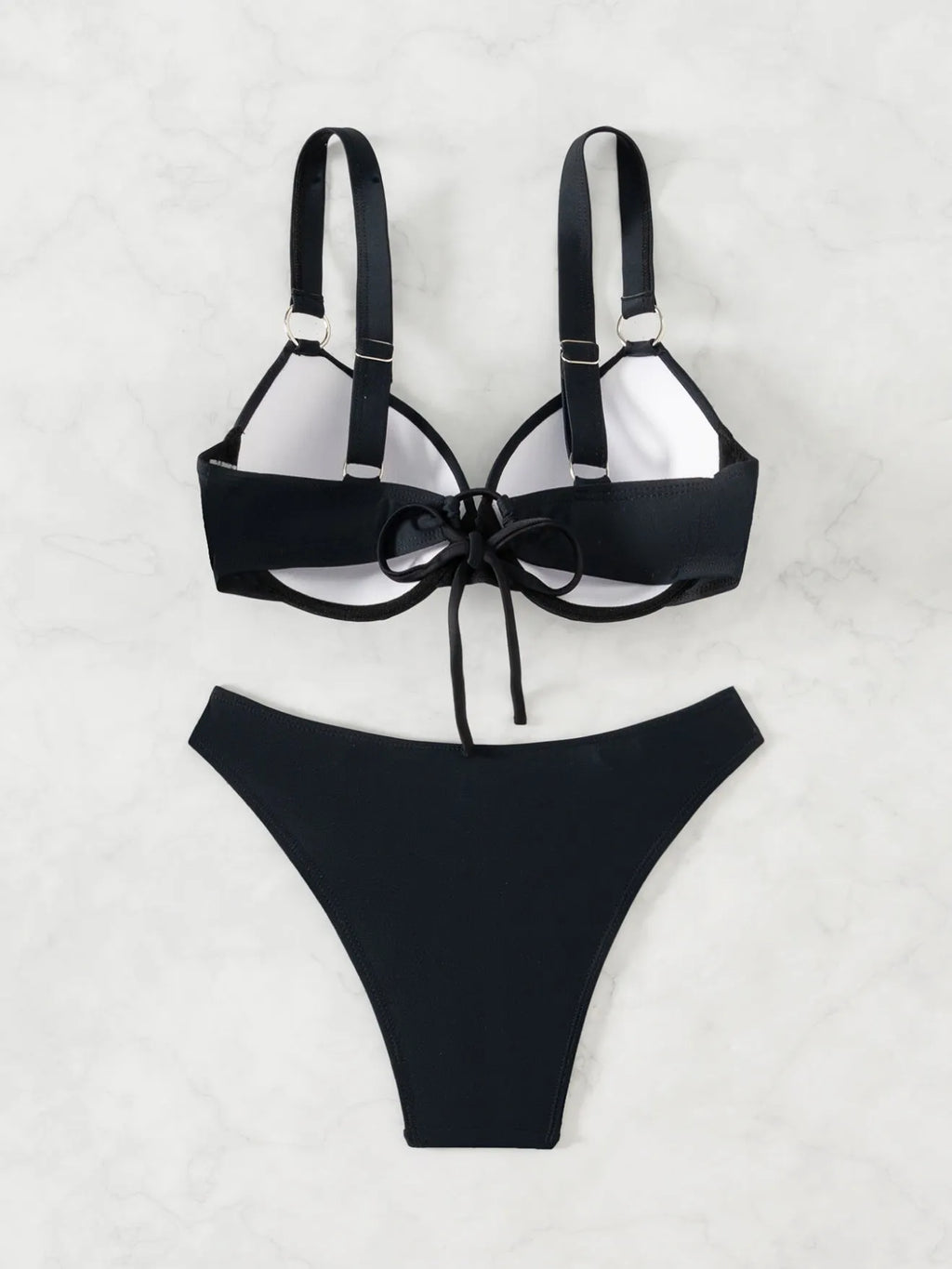 Women's solid black nylon bikini swimsuit set for swimming and wading