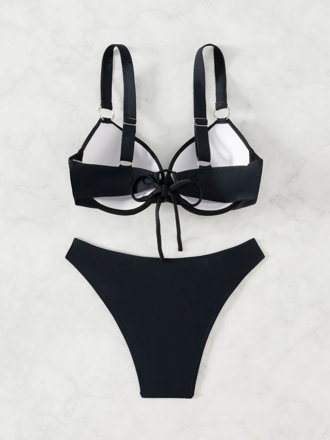 Women's solid black nylon bikini swimsuit set for swimming and wading